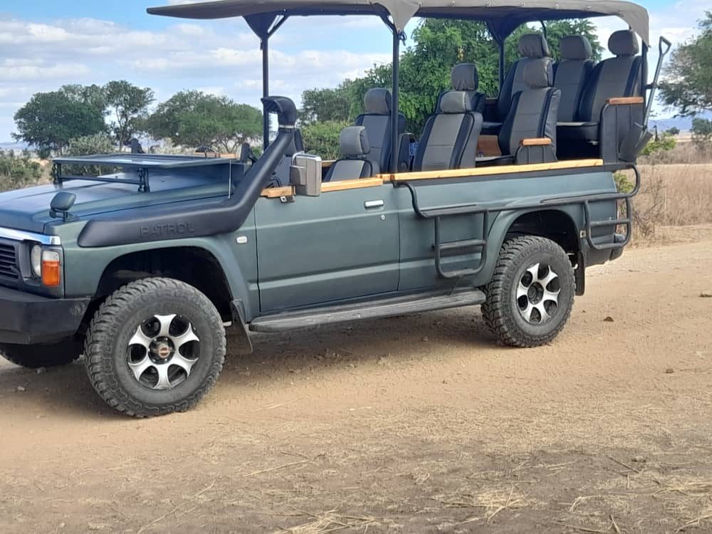 Open safari vehicle for Mikumi game drives